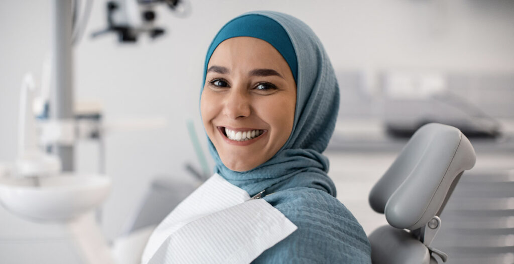 woman confidence in dental team smiling